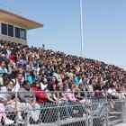 A quiet, somber crowd takes in the Every 15 Minutes crash scene on Thursday.